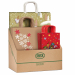 Espositore da banco con 100 shopper natale in fantasie assortite. 25 pz 16x8x21cm, 50 pz 26x12x36cm,  25 pz 36x12x41cm.
