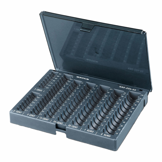 Vaschetta portamonete in polistirolo antiurto con coperchio trasparente amovibile. Colore grigio scuro. Dimensioni: 23,5x18,5x3,5cm