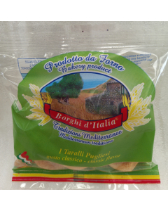 I taralli sono  preparati con un impasto a base di farine di grano selezionato, vino bianco, il miglior olio extra vergine d’oliva. Prodotto tipico pugliese, è reso originale dalla sua friabilità che lo rende stuzzicabile ai più esigenti palati. Taralli 4