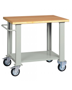 Banco con piano in legno impiallacciato in noce tanganika e bordato in faggio spessore mm. 40 raggio 2, 1 sottopiano sagomato e rinforzato, 1 manico. Struttura grigia RAL 7038. Ruote con cuscinetti diametro 15cm (2 fisse e 2 girevoli frenenti). Dimensioni