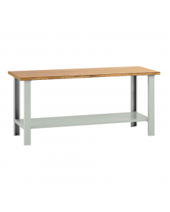 Banco da lavoro con piano in legno impiallacciato in noce tanganika e bordato in faggio spessore mm. 40, 2 fiancate e 1 sottopiano sagomato e rinforzato. Portata kg.1000. Smontato. Verniciatura a polvere grigio RAL 7038. Dimensioni: 200Lx75Px90Hcm .Fornit